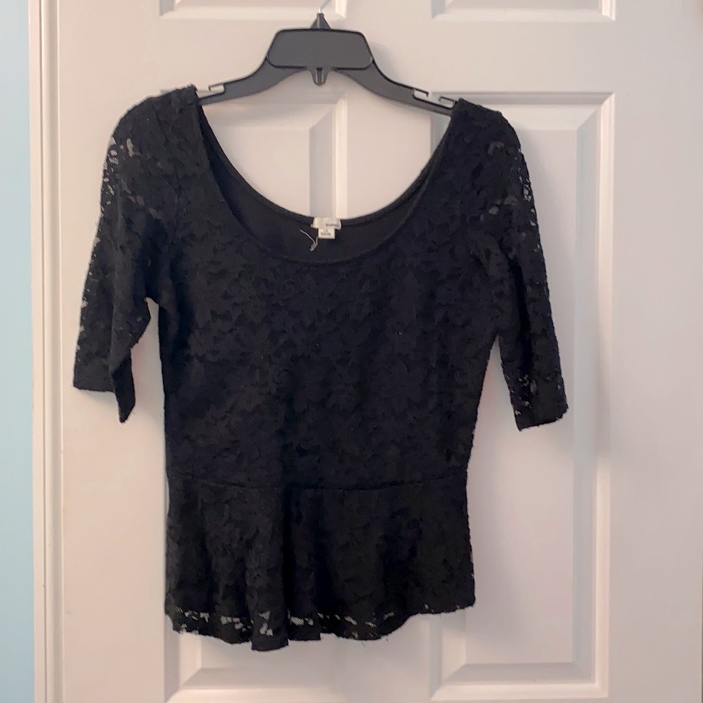 Black lace cinched waist top.